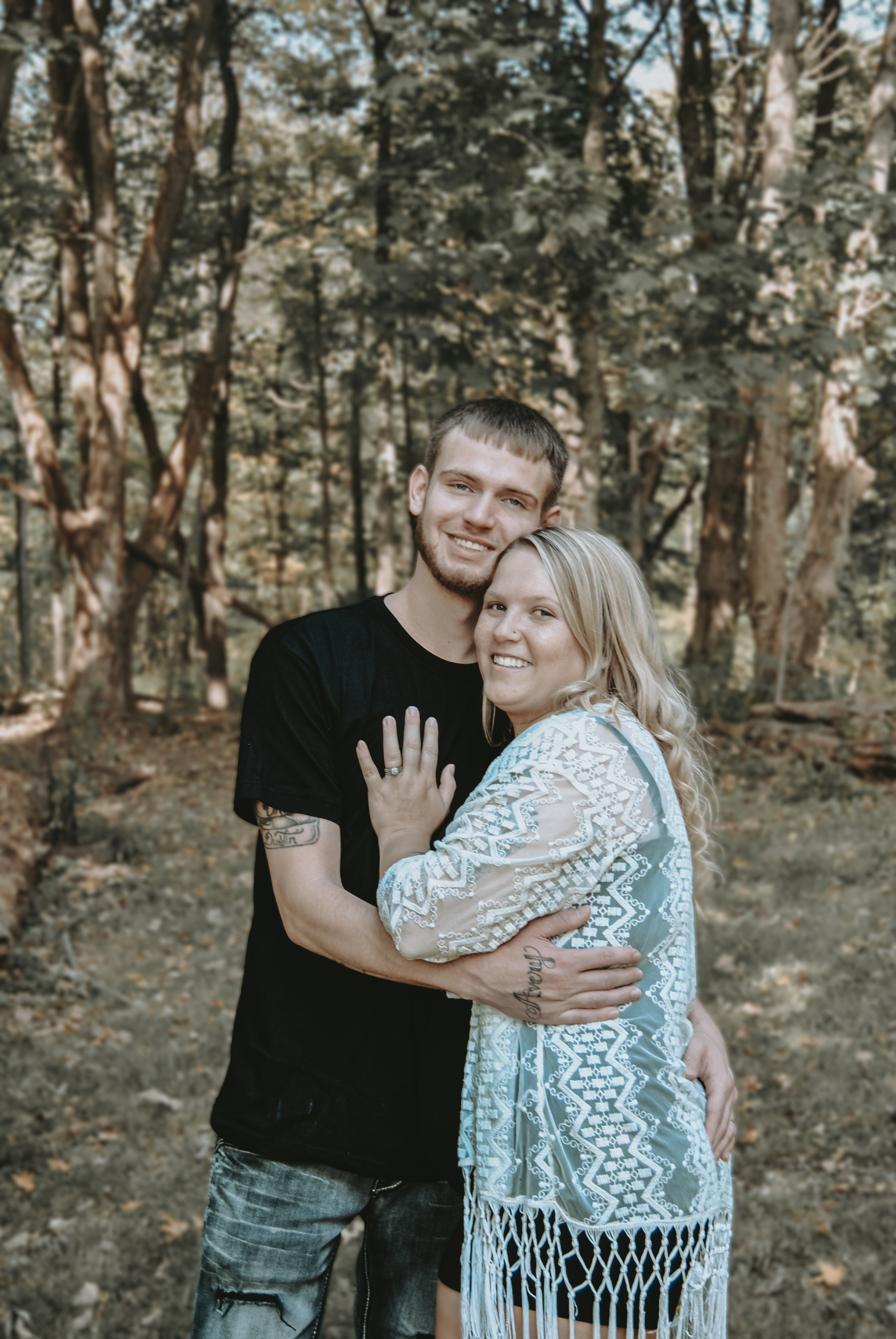 Graduate tossing cap in warm sunset light