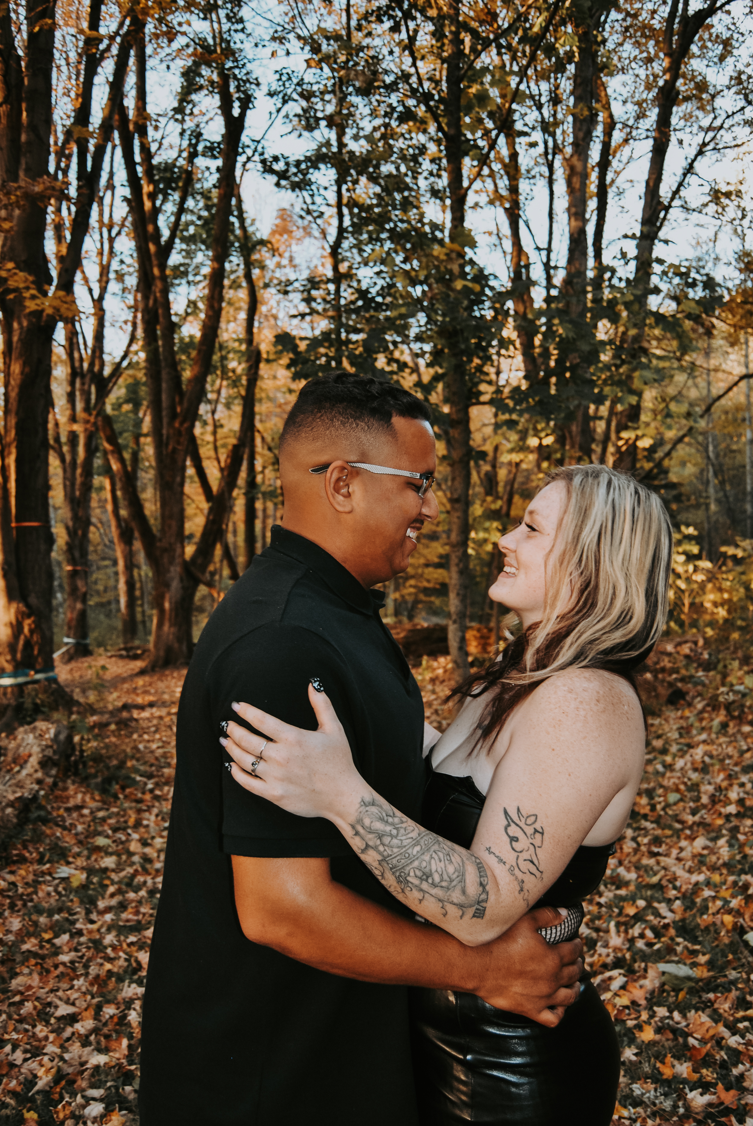Family laughing together during fall session
